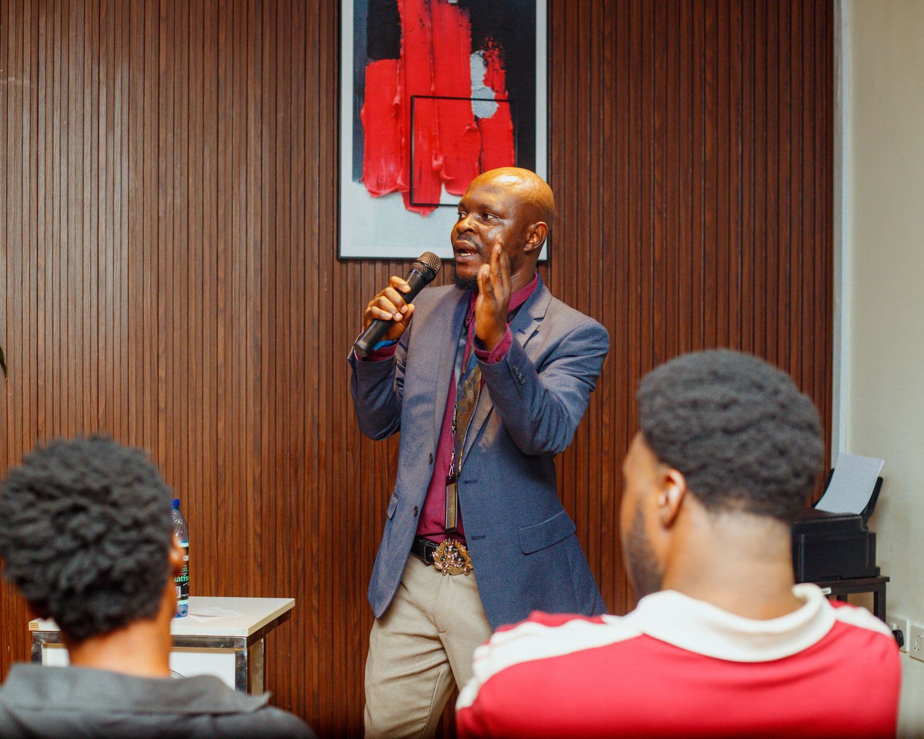A speaker makes a point to the audience