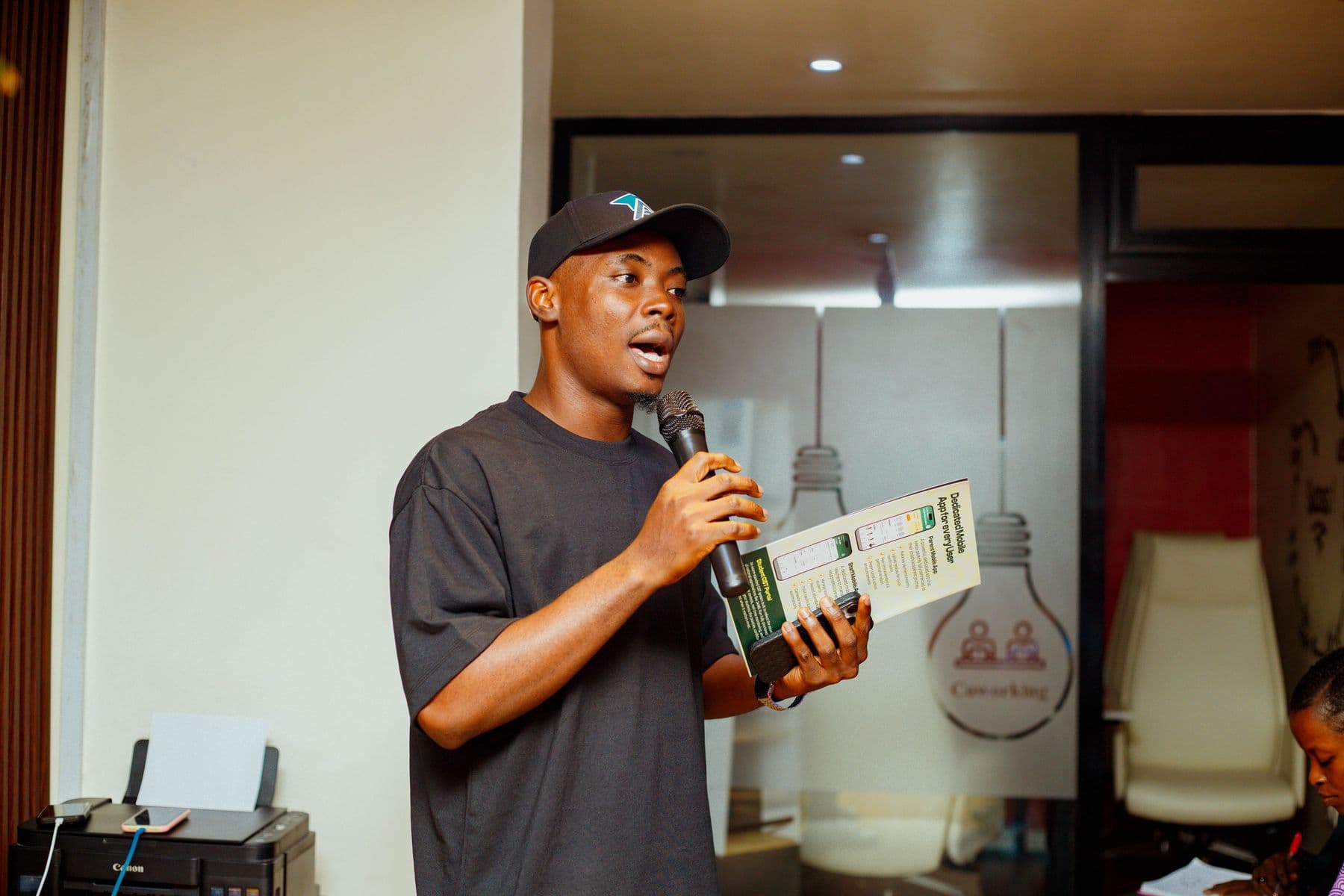 A founder presents his startup to the room