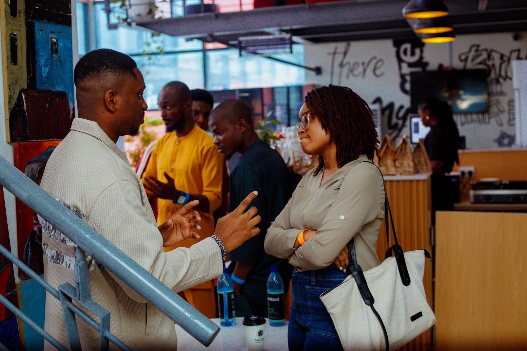 Attendees networking at Café One Studios